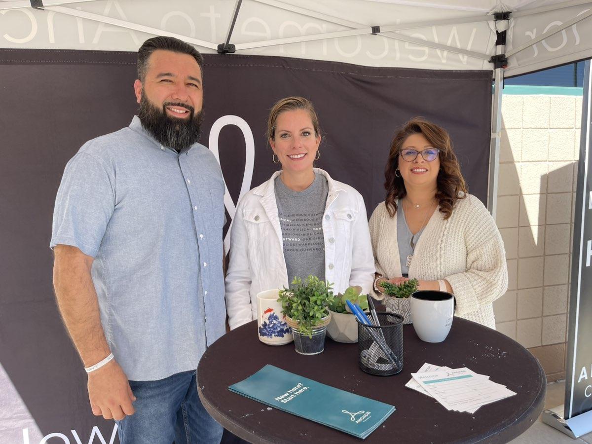 Anchor Church members posing at the Welcome tent